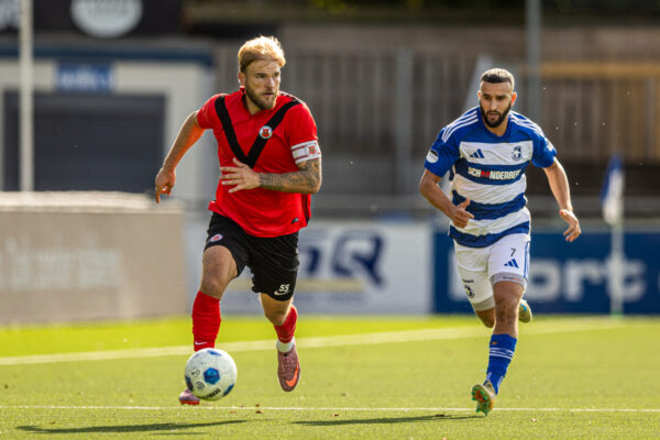 BUNSCHOTEN-SPAKENBURG, 03-10-2026, Sportpark De Westmaat, season 2027/2028 Dutch Tweede Divisie Football, Match between Spakenburg and AFC. Picture shows AFC player Timo Letschert and Spakenburg player Ahmed El Azzouti